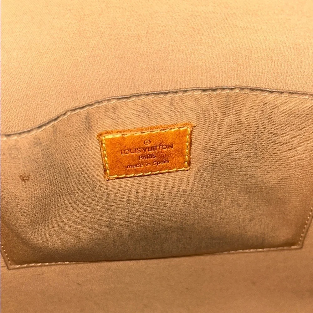 LOUIS VUITTON Gold Tote with Iconic Embossed Design